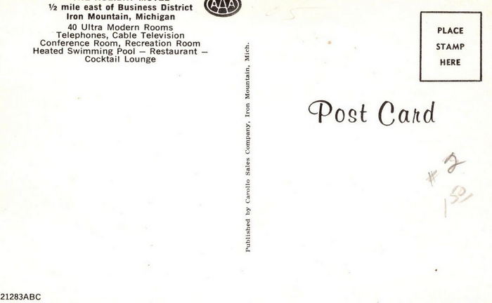 Holiday Motel (Econo Lodge Inn & Suites) - Vintage Postcard Back (newer photo)